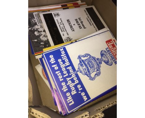 A box of vintage rugby league programmes 