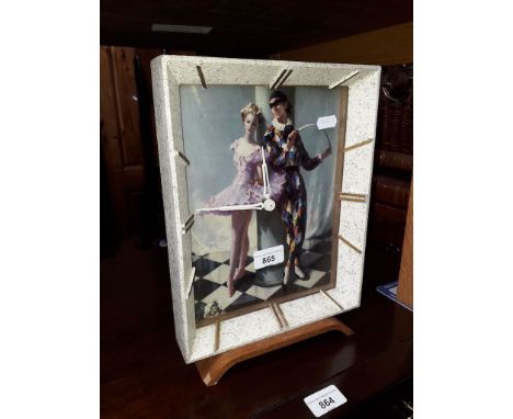 A retro Harlequin mantle clock. 
