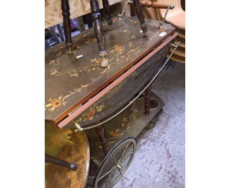 A continental style vintage drinks trolleyCondition:- general wear through age and use, some scratches to top, no sign of any