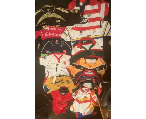 Rugby Shirt Collection: Excellent condition shirts in at least mens large sizes and larger. Teams include Wigan Wasps Saints 