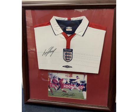 Wayne Rooney Signed Framed England Shirt: White home replica shirt and a photo of him playing wearing this style shirt both o