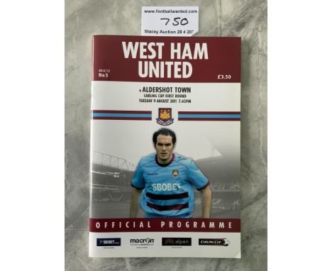 2011 - 2012 West Ham v Aldershot Postponed Football Programme: Carling Cup dated 9 8 2011 in mint condition. Rare as postpone