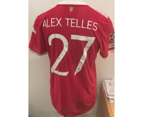 Telles 2021 - 2022 Manchester United Match Issued Football Shirt: Red short sleeve with Telles 27 to rear. UEFA Foundation ba