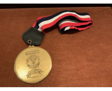 2001 Singapore X1 v Manchester United Players Medal: Large gold coloured medal with Manchester United badge and the words Cou