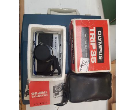 Imperial 203 portable typewriter w/instructions together with an Olympus Trip 35 boxed camera. 