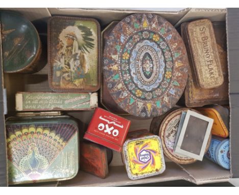 A mixed collection of vintage advertising tins 