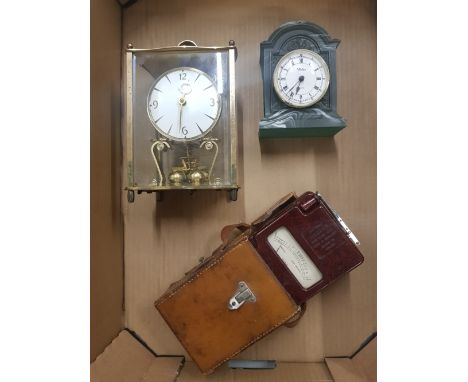 A Kundo branded anniversary clock, together with a small Aynsley mantel clock and a leather cased Ohms meter (3). 