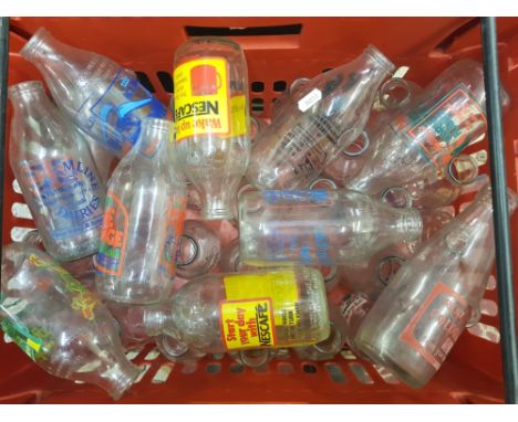 A large collection of vintage Advertising Milk bottles including Nescafe, Kellogg's examples etc 