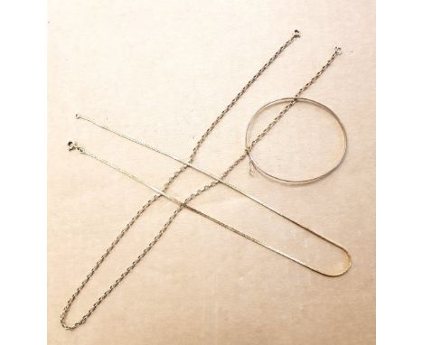 A group of 9ct yellow gold jewellery to include a gold bangle and 2 necklaces total weight 10.1g. 