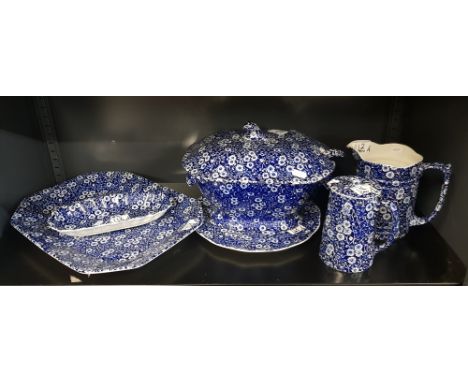 A collection of Burleigh Ware Calico patterned serving items to include soup tureen and ladle, jugs, serving platters etc (6)