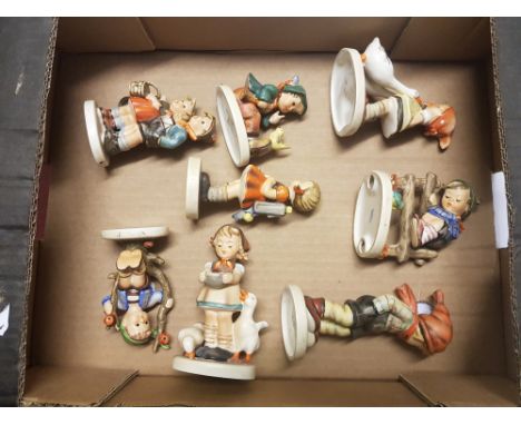 A collection of 8 Goebel/Hummel figures, height of tallest 12cm (8). 