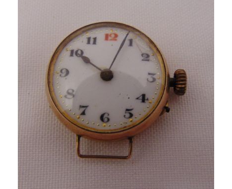9ct gold wristwatch with white enamel dial and Arabic numerals