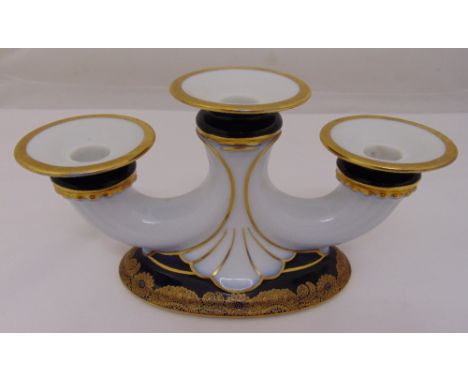 Hutschenreuther 1920s three light candelabrum on cobalt blue oval base with gilded decoration, marks to the base, 14.5cm (h)