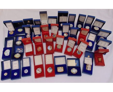 A quantity of Halcyon Days enamel boxes of various form and size all in original packing some with COAs (38)