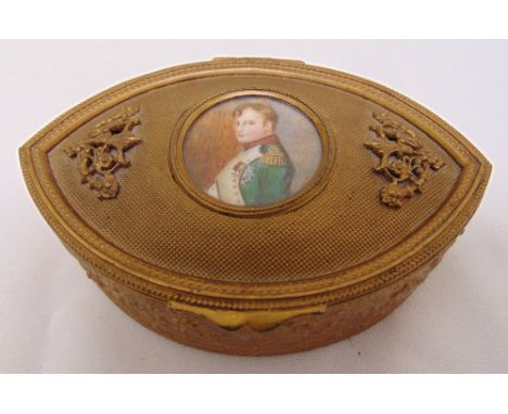 A continental gilded metal oval trinket box, the hinged cover set with a portrait of Napoleon, 11cm (w)