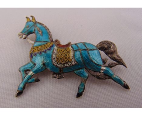 Silver and enamel brooch in the form of a horse