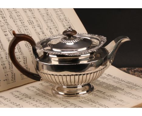 Paul Storr - a George III silver half-fluted lamp shaped teapot, flush-hinged cover with knop finial, scroll capped handle, d