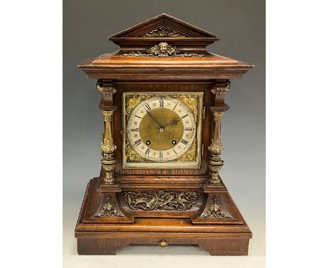 A late 19th century German Lenzkirch table or mantel clock, Black Forest region, with architectural oak case, bronze coloured