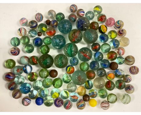 A collection of 19th century and later glass marbles, ranging from approx 24mm to 14mm diameters, including latticino and mul