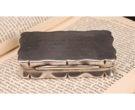 A George V silver shaped rectangular snuff box, hinged cover inscribed 'Presented to A Fotheringham by "Daily Telegraph" Case