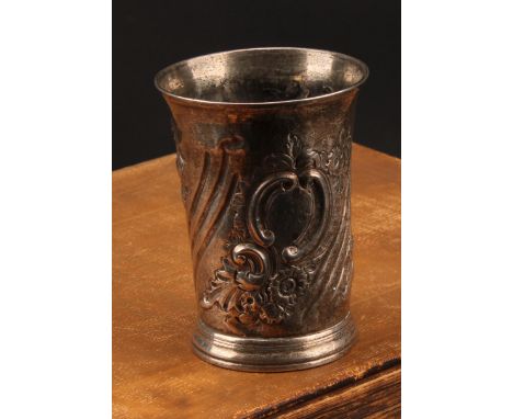 An early George III silver beaker, spirally fluted and chased with flowers and foliage, skirted base, 9.5cm high, William Gru