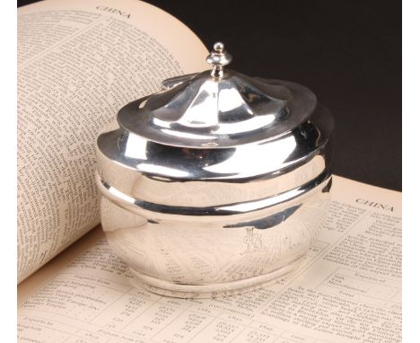 A Victorian silver oval tea caddy, hinged cover with knop finial, gilt interior, crested, 10cm wide, Charles Stuart Harris, L