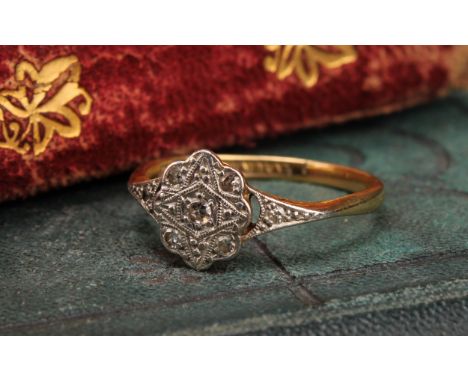 A diamond dainty cluster ring, set with seven round brilliant cut diamond, total estimated diamond weight approx 0.15ct, B &a