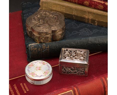 An early 20th century Continental silver and guilloche enamel circular pill or snuff box, hinged cover decorated with flowers