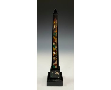 An Ashford marble and pietra dura ebonised obelisk, in the Grand Tour manner, square base, 31cm high