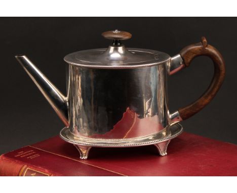 A George III silver oval teapot, quite plain, hinged domed cover, beaded borders, flush-hinged cover, fruitwood fittings, 27c