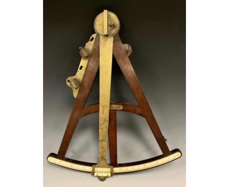 An early 19th century Maritime Octant sextant, unnamed brass and mahogany body, ivory register 0-90, 46cm x 37.5cm, c.1810Ivo