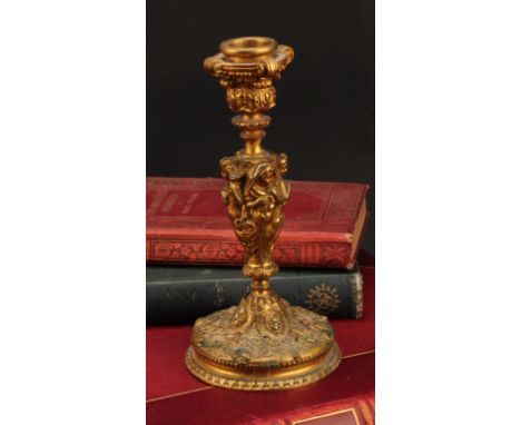 A 19th century French Bacchanalian gilt bronze candlestick, well cast with the Cherubs representing the four seasons column, 