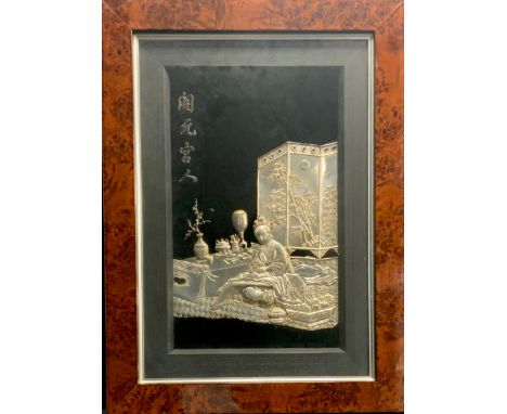 A Chinese Electrotype or silver embossed panel Geisha seated at the tea table resting upon a rug, a folding screen behind, fr