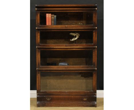An early 20th century oak barrister's bookcase, by Globe Wernicke, comprising four modular stacking sections, 146.5cm high, 8