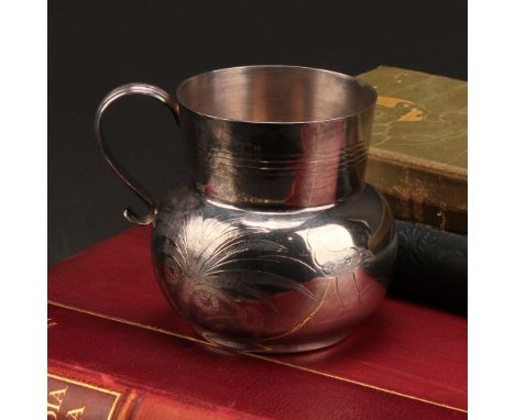 A James II style silver pot bellied mug, engraved in the chinoiserie taste with a Chinese ho-ho bird, flowers and stylised tr