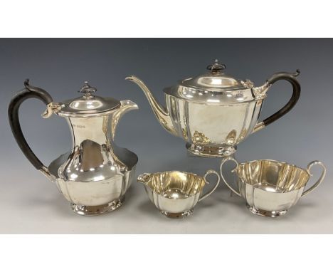 A George V silver four piece tea service, comprising teapot, hot water jug, milk jug and twin handled sugar bowl, Fenton Brot