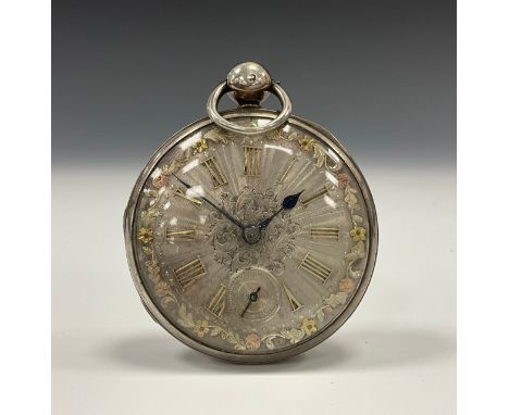 A Victorian silver cased open face pocked watch, machined silver dial, the blue hands rotating on a foliate centre, Roman num
