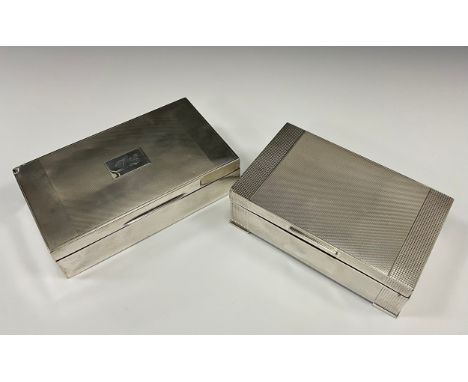 A silver cigarette box, engine turned and striped exterior, 15.6cm x 9cm x 4cm, Gladwin Ltd, Birmingham 1936; another, Birmin
