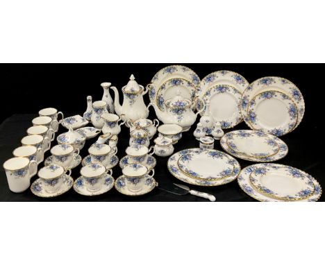 A Royal Albert Moonlight Rose pattern tea service for six comprised of; a tea pot, a coffee pot, sugar pots, condiment pot, m