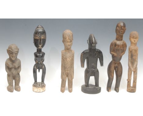 Tribal Art - a Bamana figure, 27cm high, Mali; others, Baule; Lobi; etc (6)