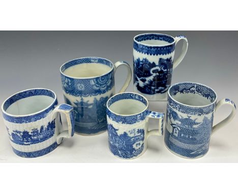 Early 19th century pearlware blue and white transfer printed mugs including a pearlware flute banded mug, 10cm high; others (