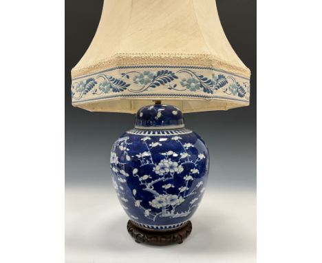 A 19th century Chinese export porcelain blue and white ginger jar later converted to a table lamp,  decorated with Cherry blo