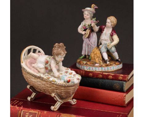 A Meissen porcelain figure group, Allegory of Autumn, modelled as a girl and boy in 18th century costume, she stands holding 