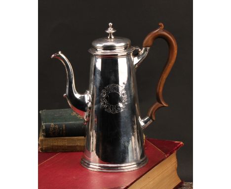An early George II silver spreading cylindrical coffee pot, quite plain, vacant Rococo cartouche, fruitwood scroll-capped han