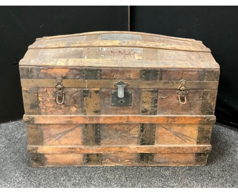 A 19th century dome top travelling trunk, with original fitted interior, 67cm high x 92cm x 50.5cm.