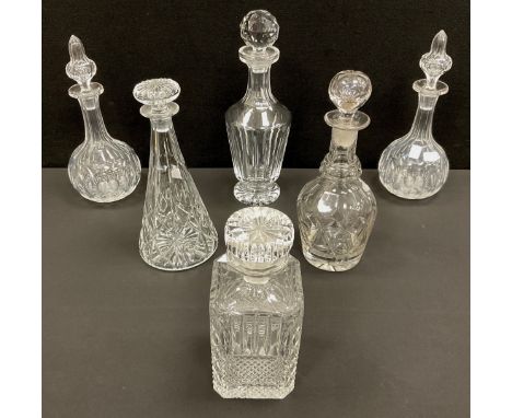 A pair of Victorian Shaft and Globe cut glass decanters, c.1880, each standing 29cm high; a 19th century cut glass decanter, 