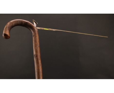 An Elizabeth II silver mounted horse measuring walking stick, curved handle, the shaft enclosing a scale and level, 93cm long