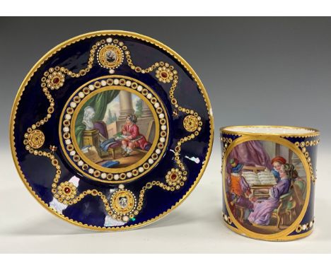 An 18th century Sevres porcelain cabinet cup and saucer, the cup vignette with child musicians with piano, cello and violin, 