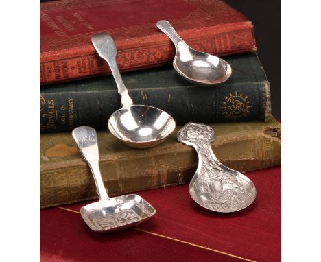 A George III silver caddy spoon, rounded rectangular bowl engraved with wrigglework, 8cm long, Joseph Wilmore, Birmingham 181