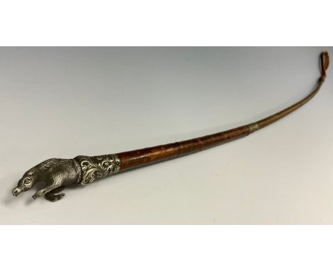 A Victorian leather riding crop, mounted with a rampant horse bust finial above a white metal pommel, white metal collar cast